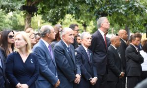 men gathering at funeral service